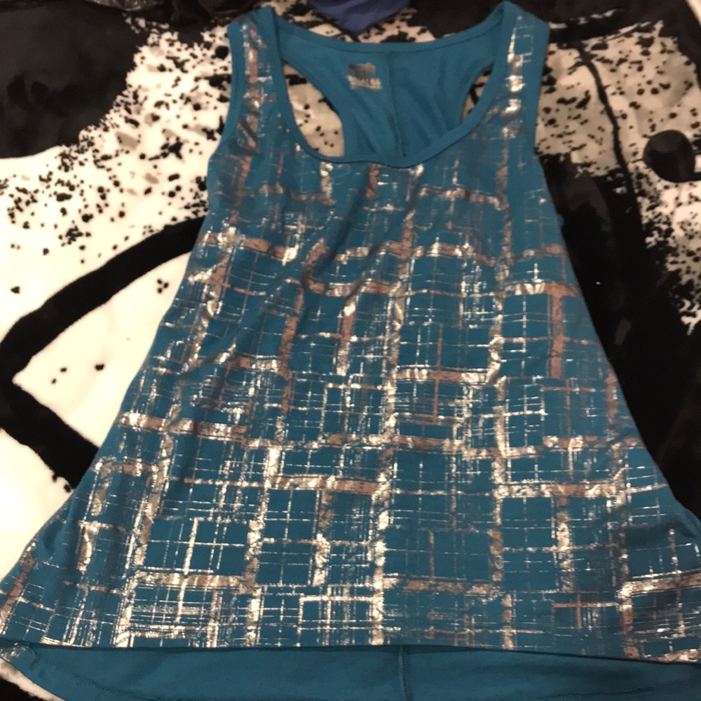 Teal patterned tank top.